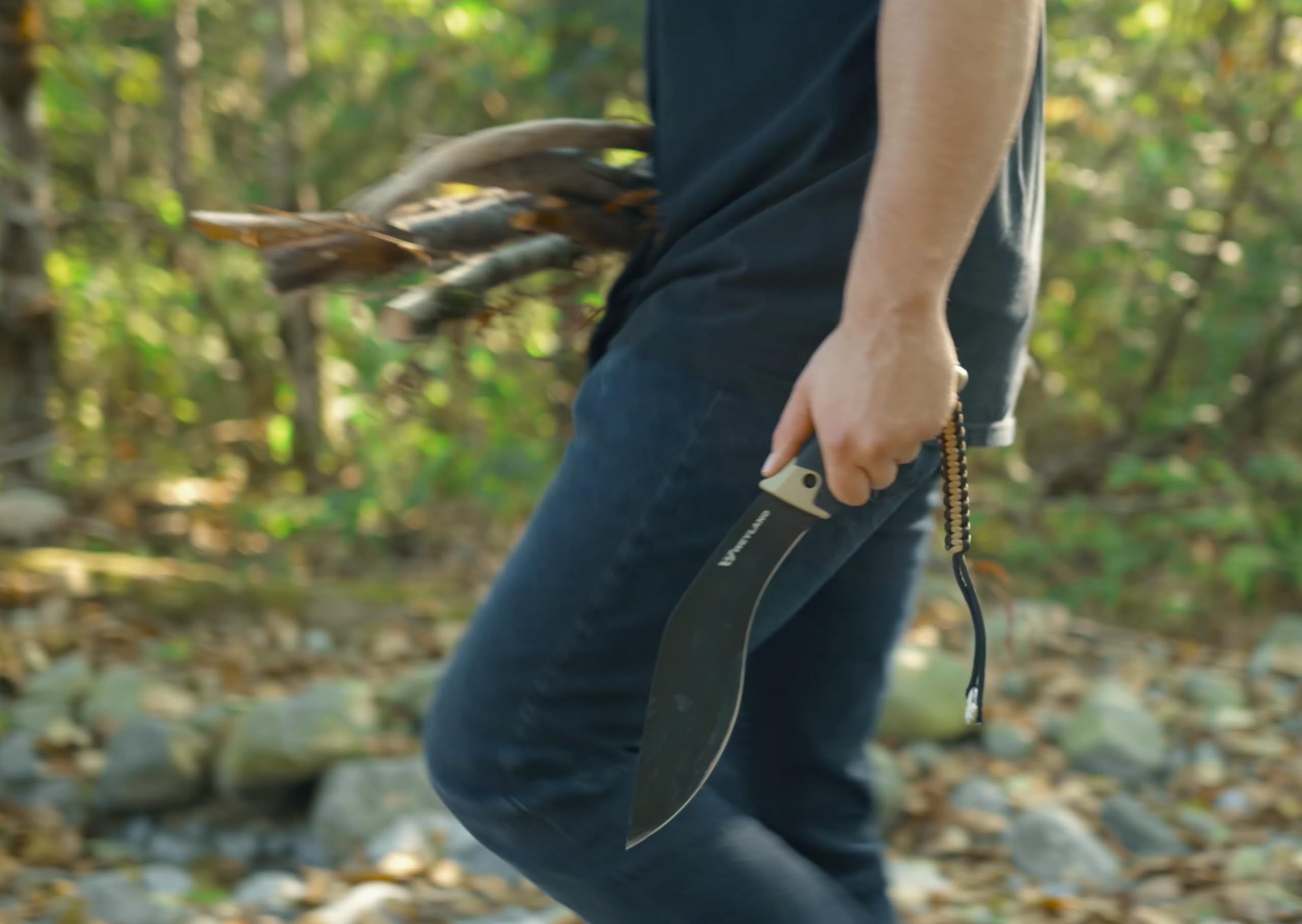 WEYLAND kukri chopping wood demonstrating powerful forward-weighted impact
