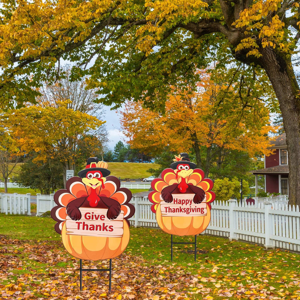 Whaline pair displayed on porch among pumpkins showing festive entryway decoration
