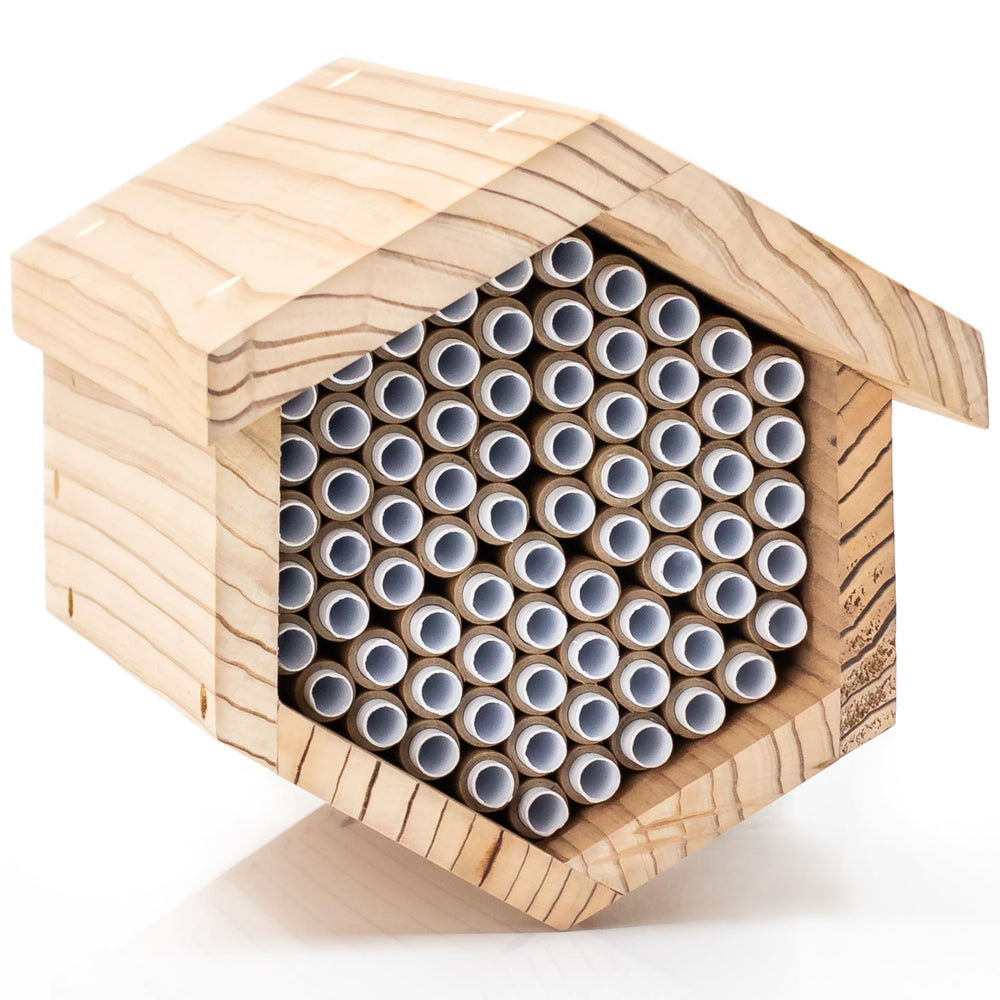 WHITEHORSE cedar bee house front view showing entry tubes and weatherproof design benefit