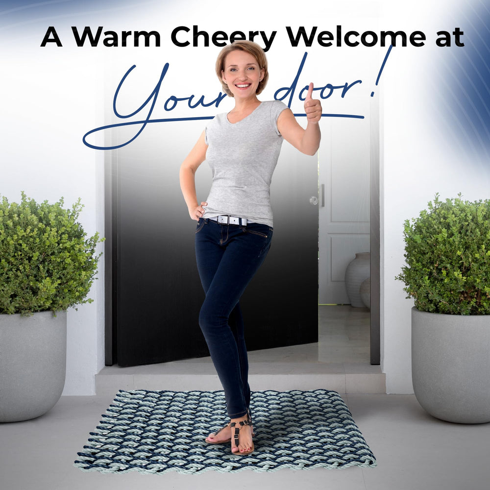 Wicked Good Doormats being hosed down showing easy outdoor cleaning benefit