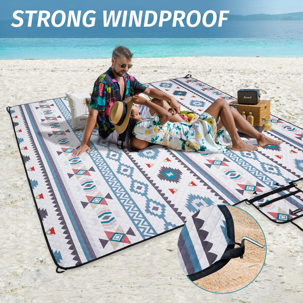 WICKERLAND rolled blanket with front pocket storing phone and keys