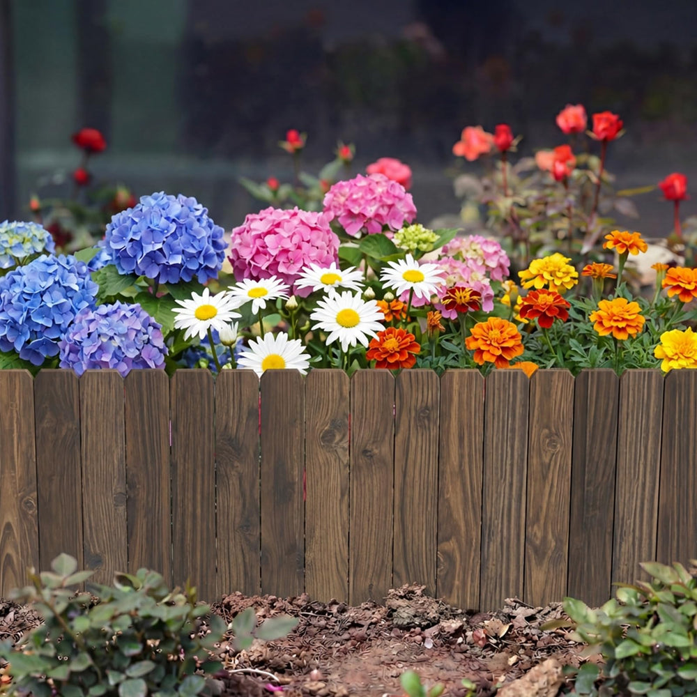 Wieghda front view of burnt wood fence edging showing rustic appeal and clear bed separation