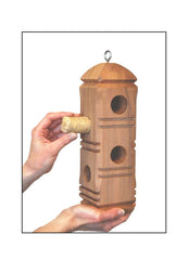 Wildlife Sciences suet plug placed in feeder with chickadee feeding, demonstrates easy use