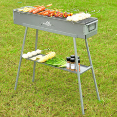 WILLBBQ accessories laid out including 20 skewers and charcoal clip for convenience