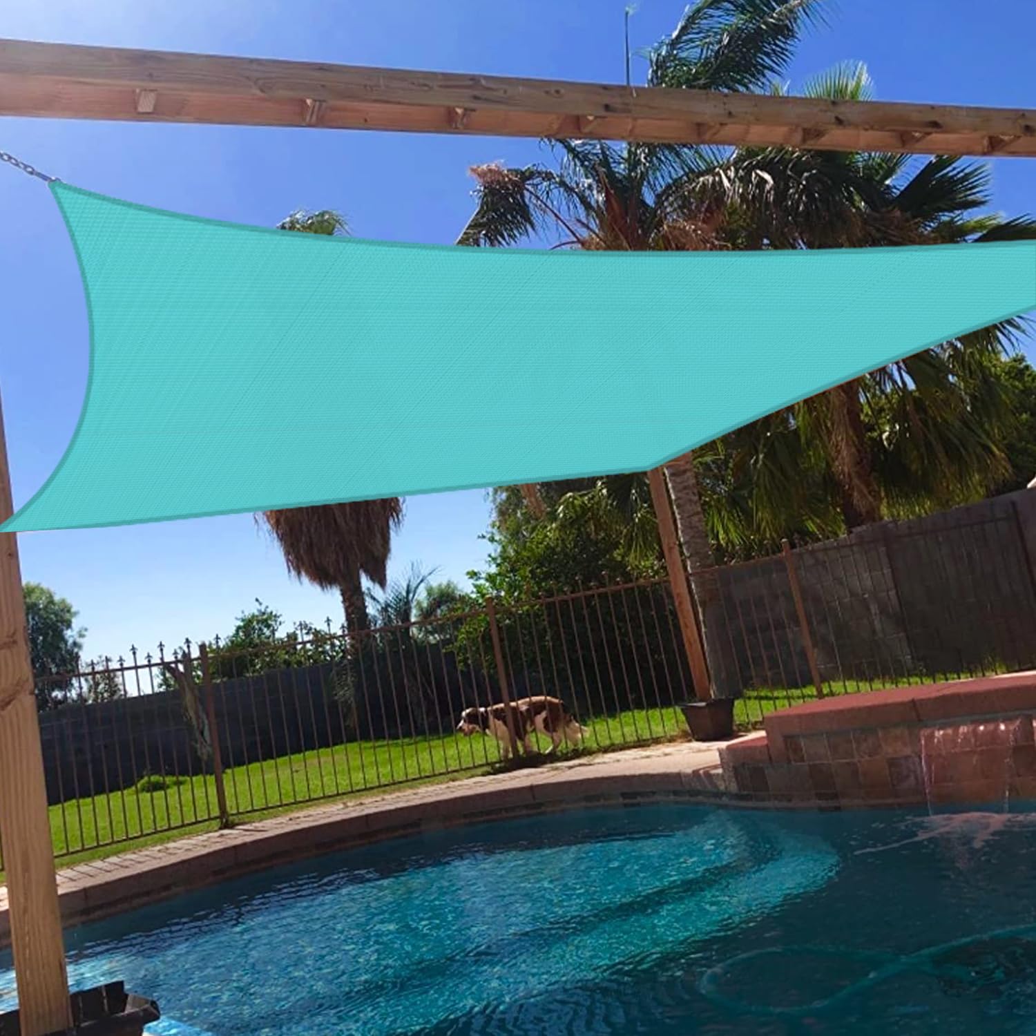 Windscreen4less turquoise shade sail front view showing vibrant color and coverage benefit
