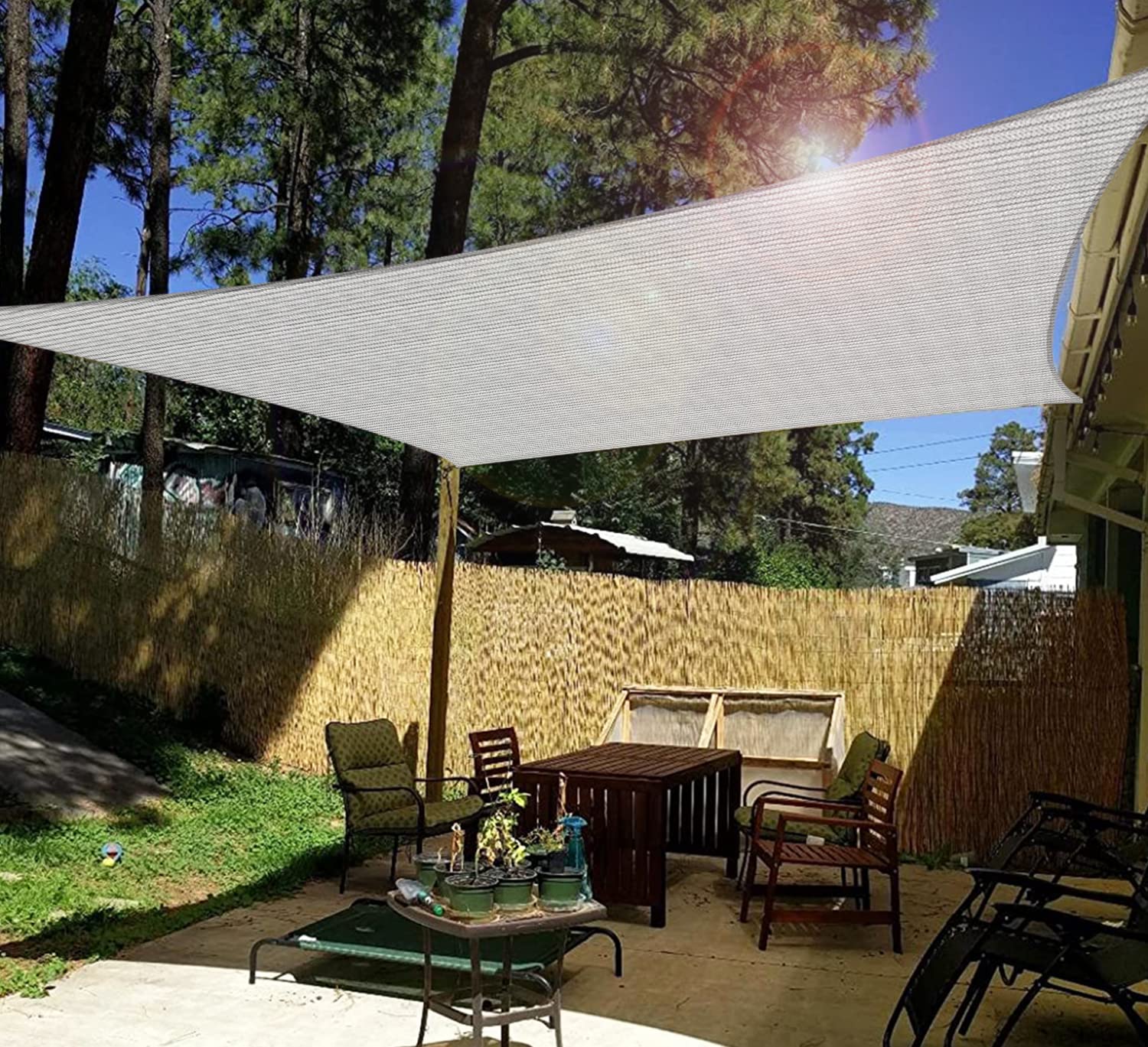 Windscreen4less size comparison with chair showing 8 by 8 foot coverage benefit