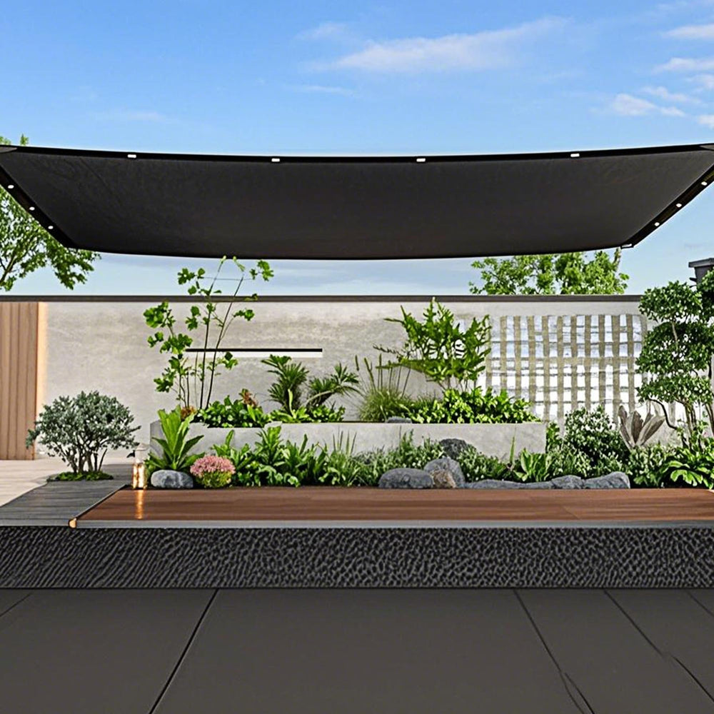 winemana installed over greenhouse providing cooler light and plant protection