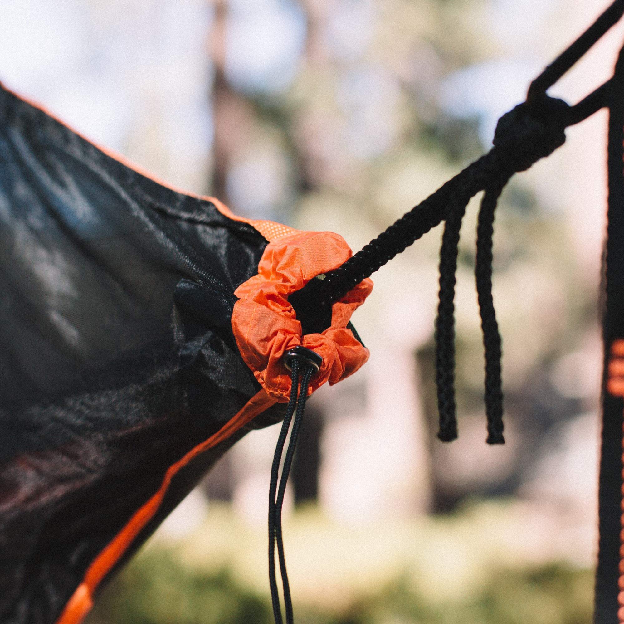 Wise Owl Outfitters SnugNet installed on hammock in forest offering insect-free rest