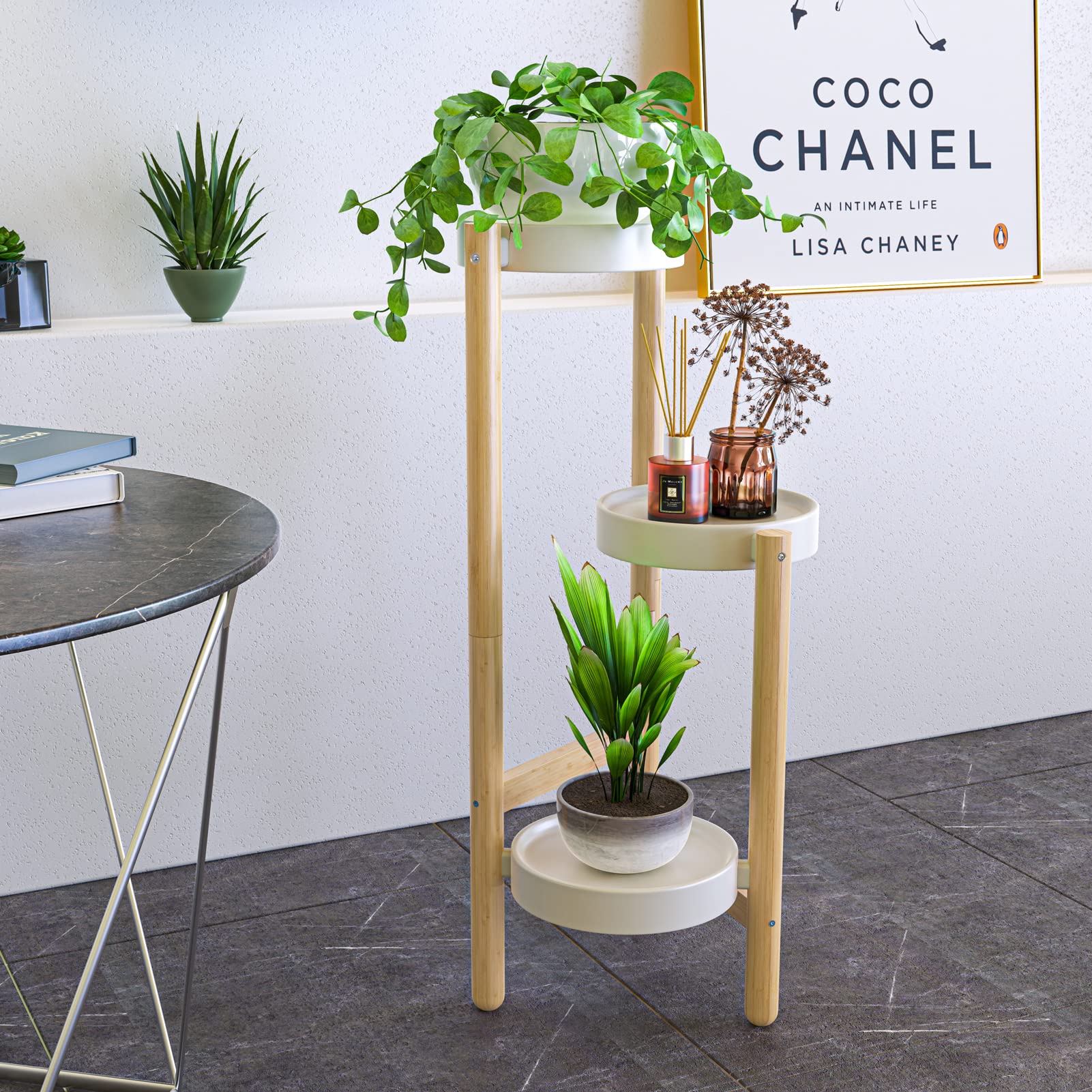 Wisuce plant stand beside sofa demonstrating compact height and scale