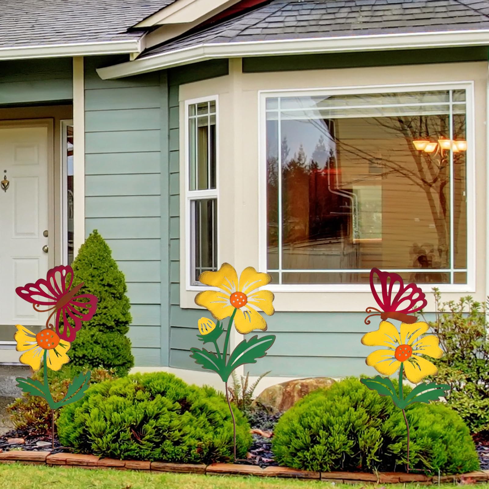 WKHOMEDECO three metal flower stakes lining a garden pathway adding colorful vertical accents and curb appeal