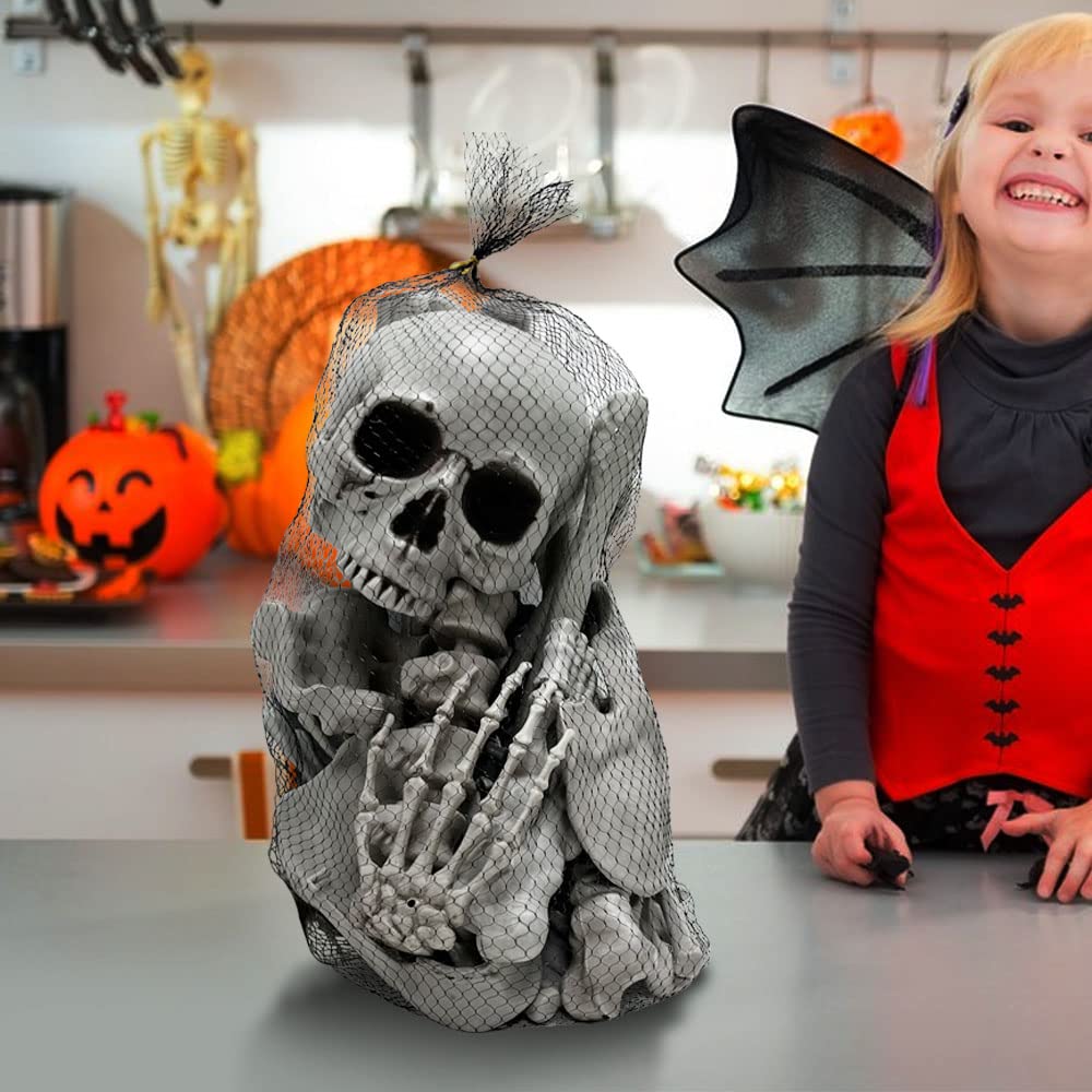 Wocst tabletop Halloween centerpiece using assorted bones as party decor accents