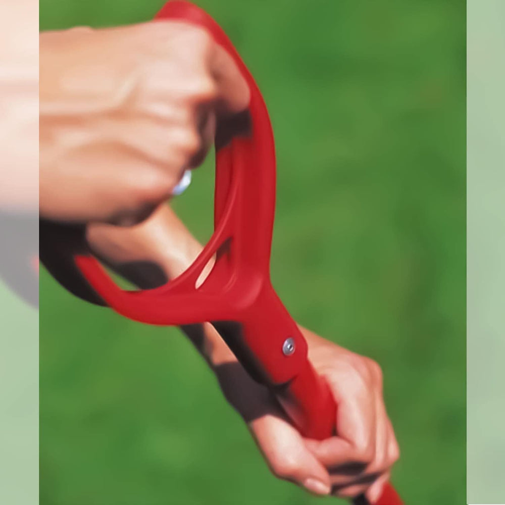 WOLF Garten handle in a planted garden demonstrating versatile multi-tool use