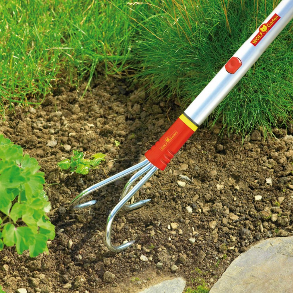 WOLF-Garten handle length shown next to measuring tape for scale and leverage