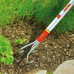 WOLF-Garten handle length shown next to measuring tape for scale and leverage