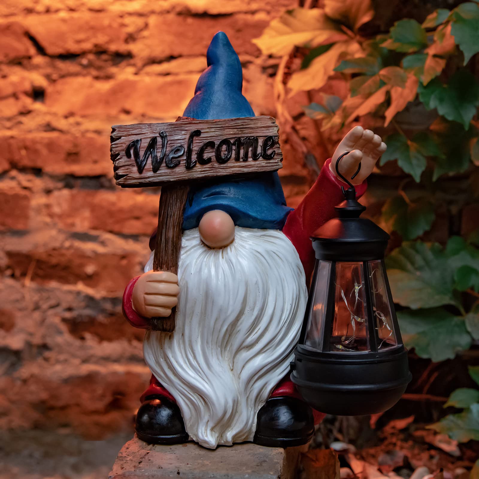 WONDHOME gnome beside a hand to show compact size and scale