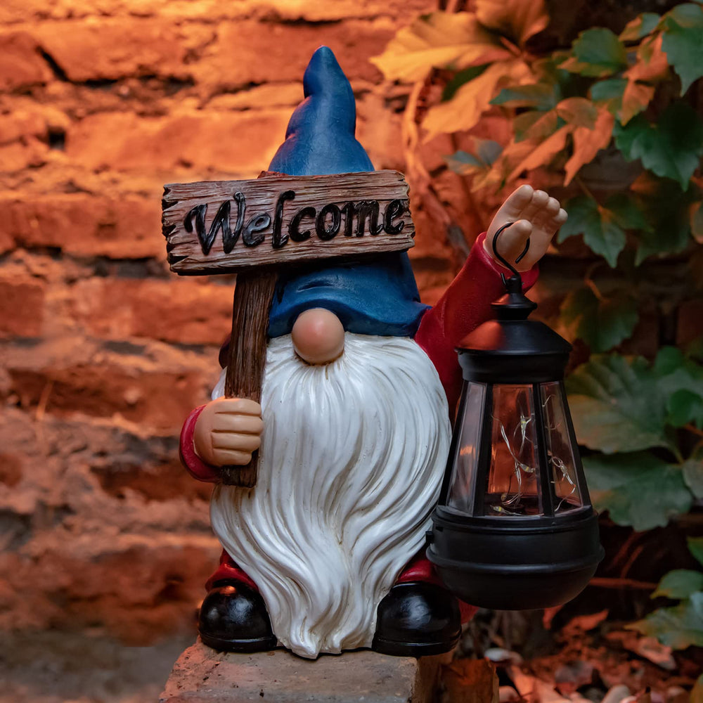 WONDHOME gnome beside a hand to show compact size and scale