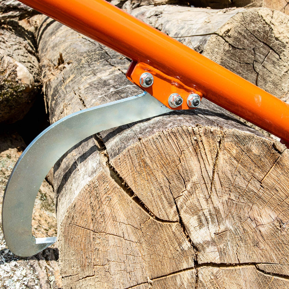 Wood-Mizer cant hook used to roll a large log demonstrating leverage