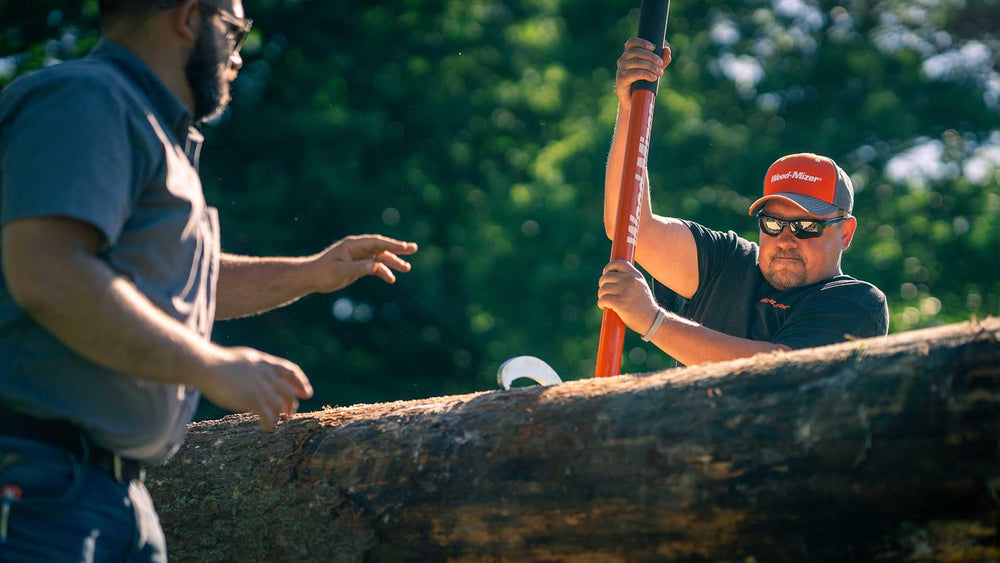 Wood‑Mizer next to a 24-inch log showing size and diameter capacity