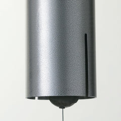 Woodstock Chimes hanging on a porch demonstrating outdoor placement and peaceful sound