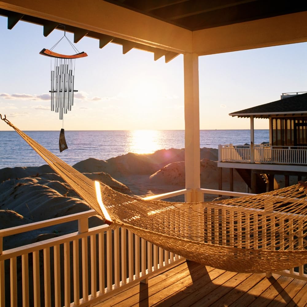 Woodstock Chimes hanging on patio, illustrating serene garden soundscape and decorative appeal