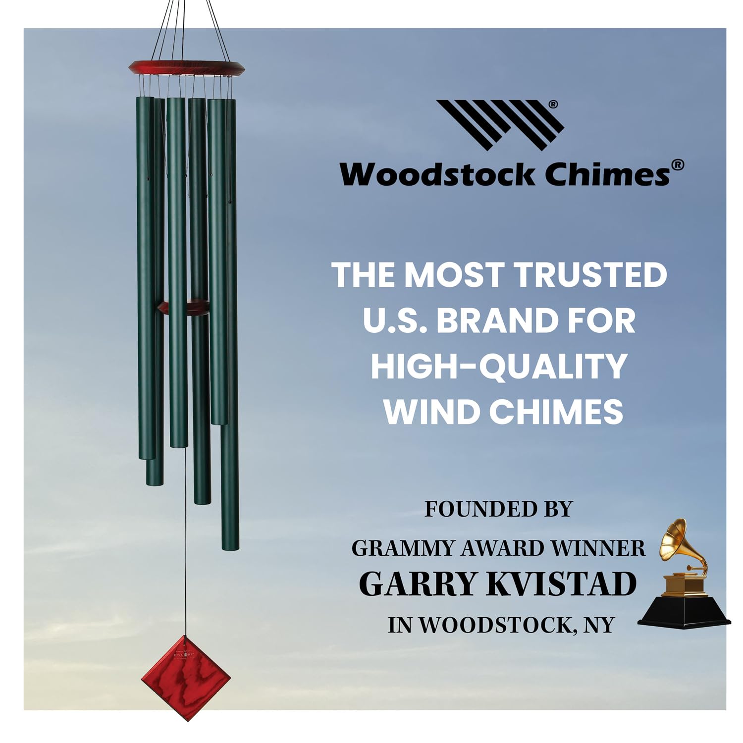 Woodstock Chimes Neptune next to chair for scale showing 54-inch length and visual impact