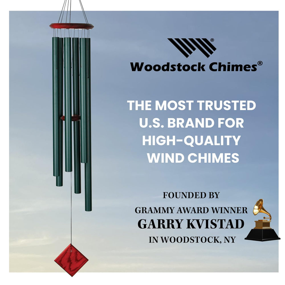 Woodstock Chimes Neptune next to chair for scale showing 54-inch length and visual impact