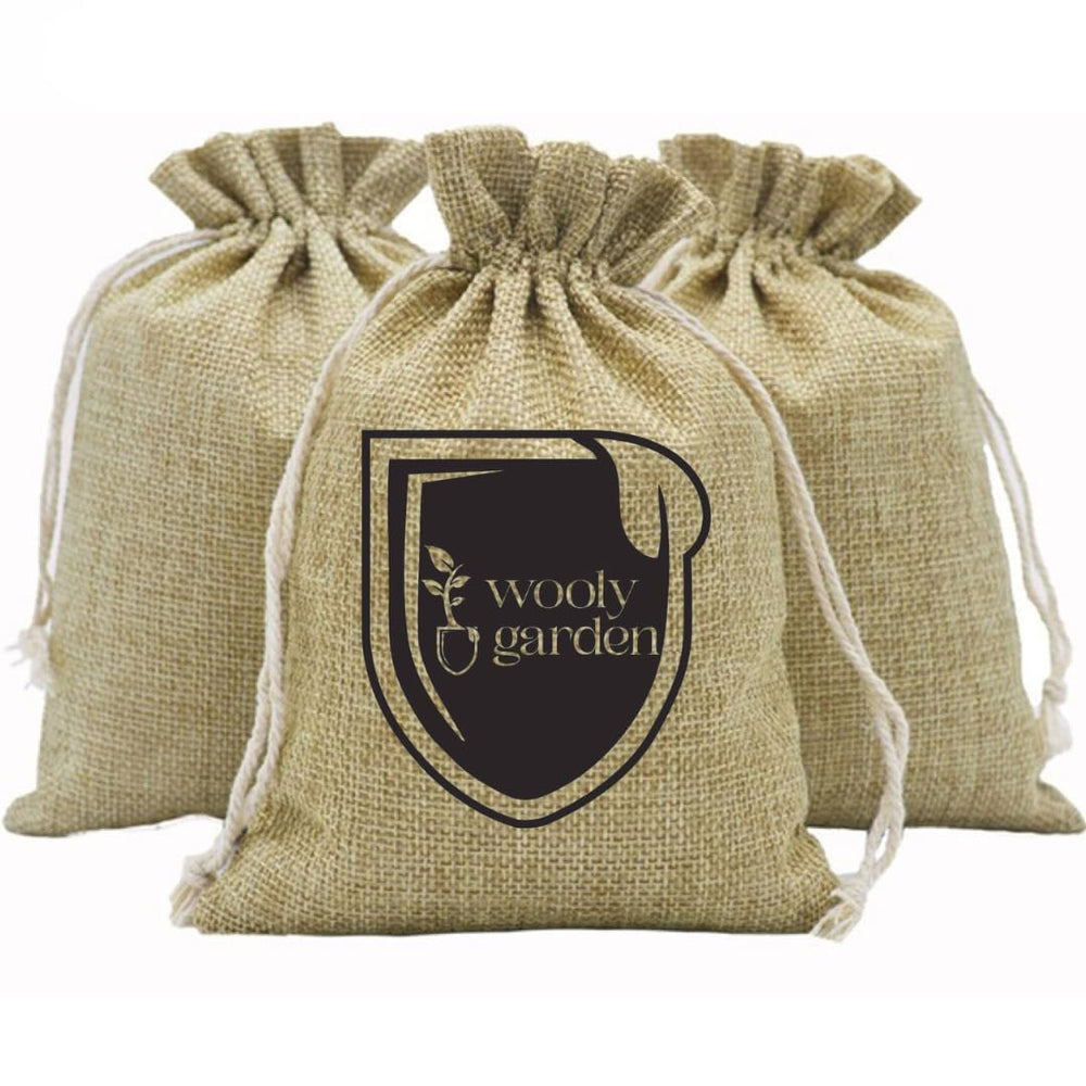 Wooly Garden front packaging showing 5 lb bag and natural wool fertilizer benefits