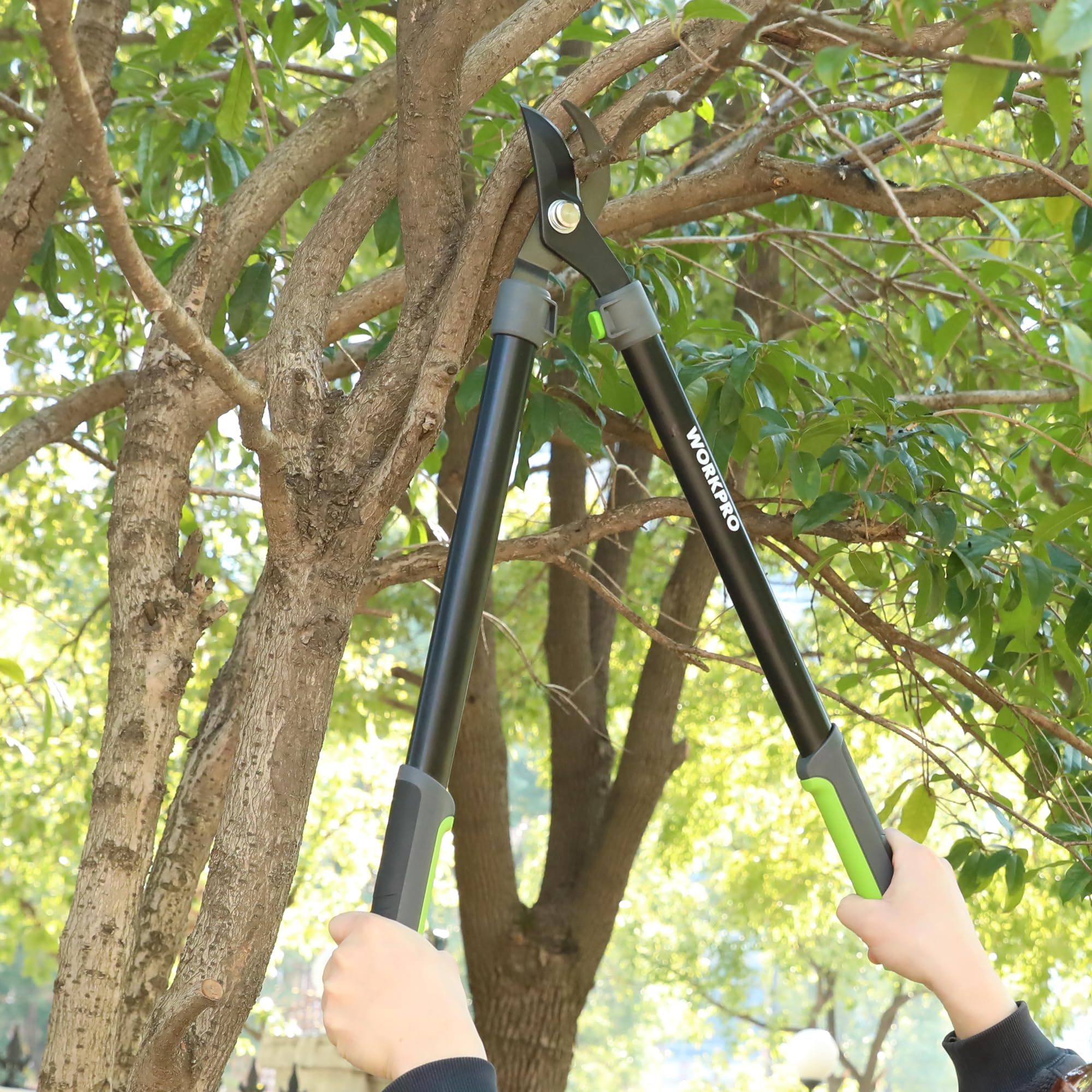 WORKPRO lopper in garden scene trimming shrubs showing ergonomic outdoor use
