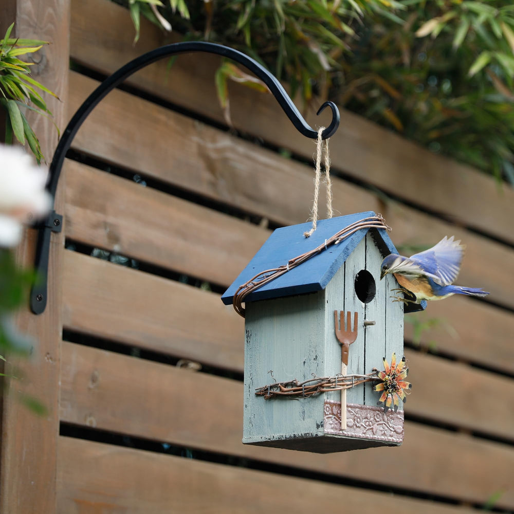 Worth bracket supporting a hanging flower basket showing visual styling benefit