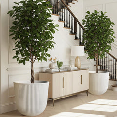 Worth planters in use on front porch with plants, showing curb appeal and durability
