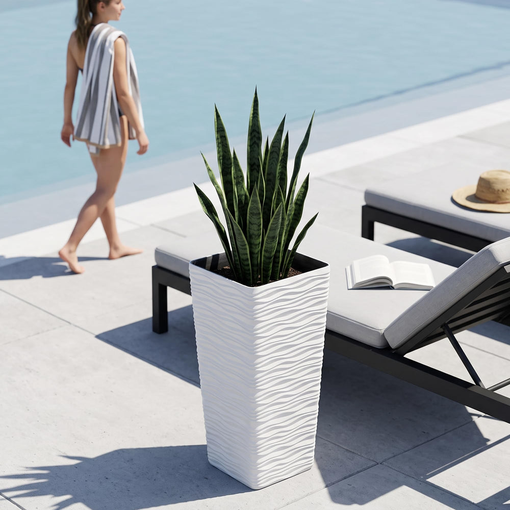 Two Worth planters flanking an entryway creating symmetrical curb appeal
