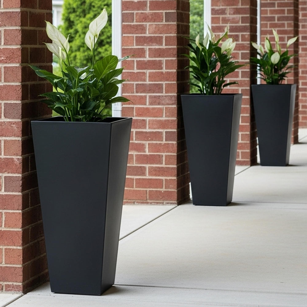 Worth planters on patio with tall plants showing outdoor styling benefit