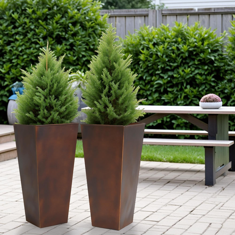 Worth planter with tall plant on porch showcasing decorative curb appeal