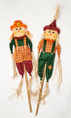 Worth Imports boy and girl scarecrows front view adding friendly fall curb appeal