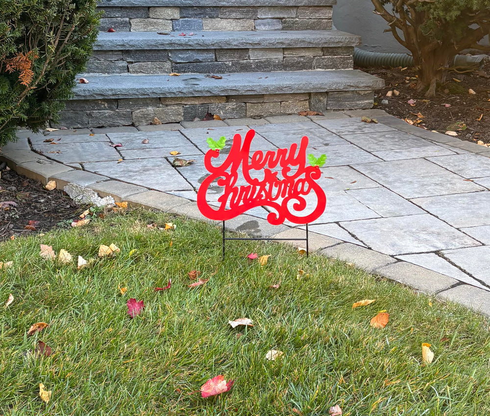 Worth Imports close-up of holly leaves and red script for decorative detail