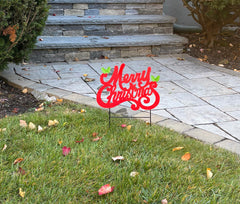 Worth Imports close-up of holly leaves and red script for decorative detail