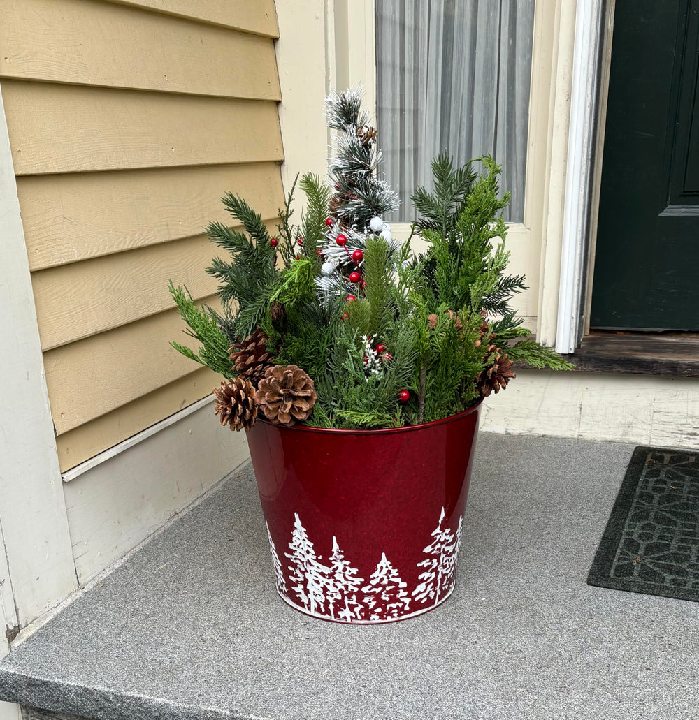 Worth Imports planter in use on patio with mixed plants showing durable outdoor benefit