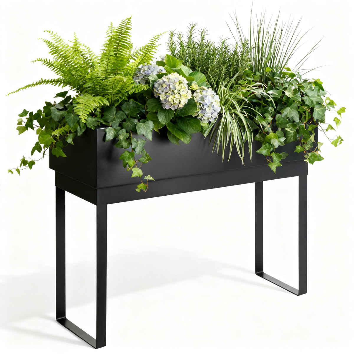 WORTH front view of raised metal planter showing matte black finish and legs, stylish durability