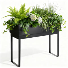 WORTH front view of raised metal planter showing matte black finish and legs, stylish durability