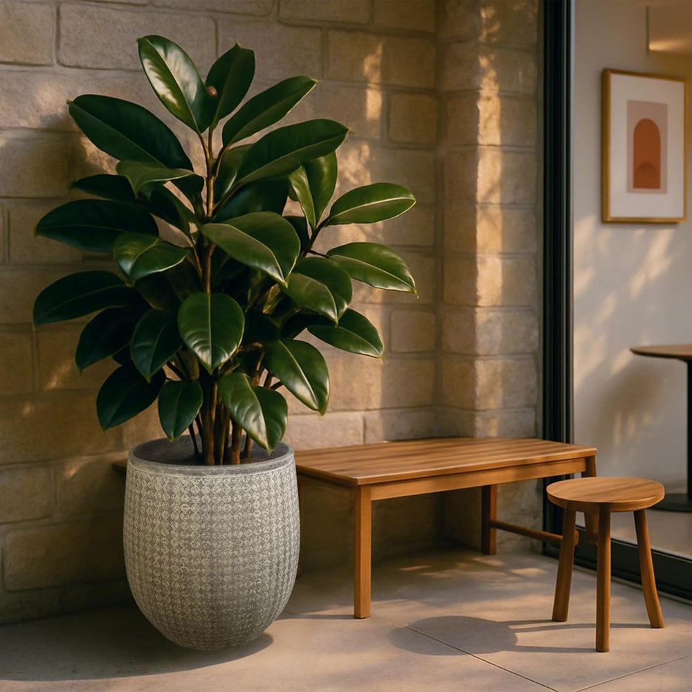 Worth planter lifestyle patio setting showing weather-resistant outdoor appeal