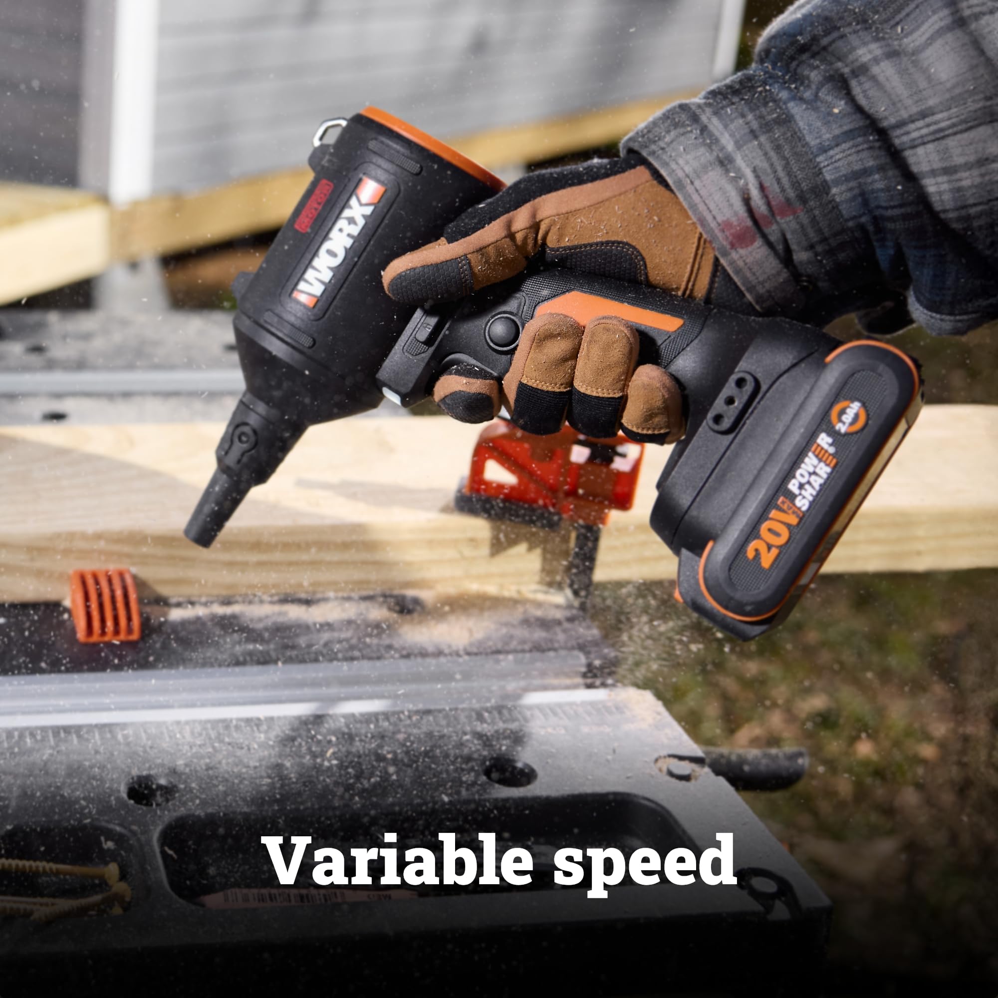 WORX blower clearing sawdust in a workshop for fast cleanup benefit