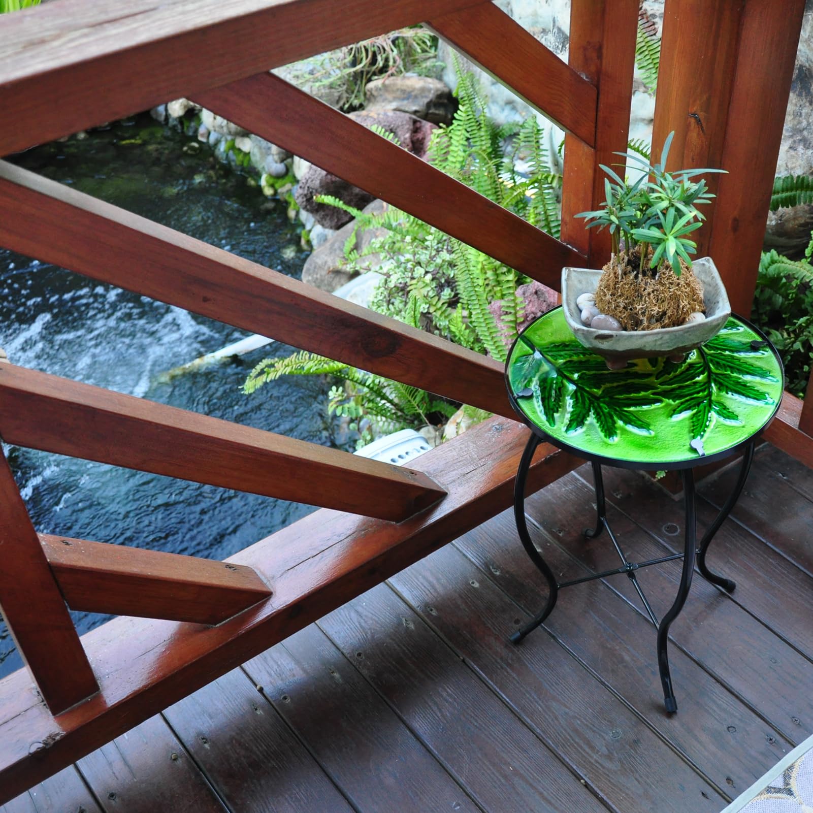 wotieuns table in patio setting with chairs demonstrating relaxed outdoor styling