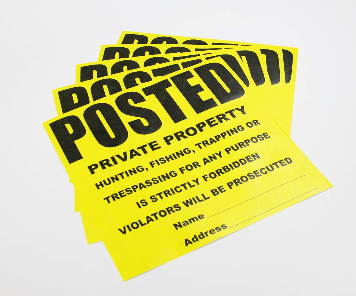WristCo sign held in hand showing compact 11 by 11 inch scale