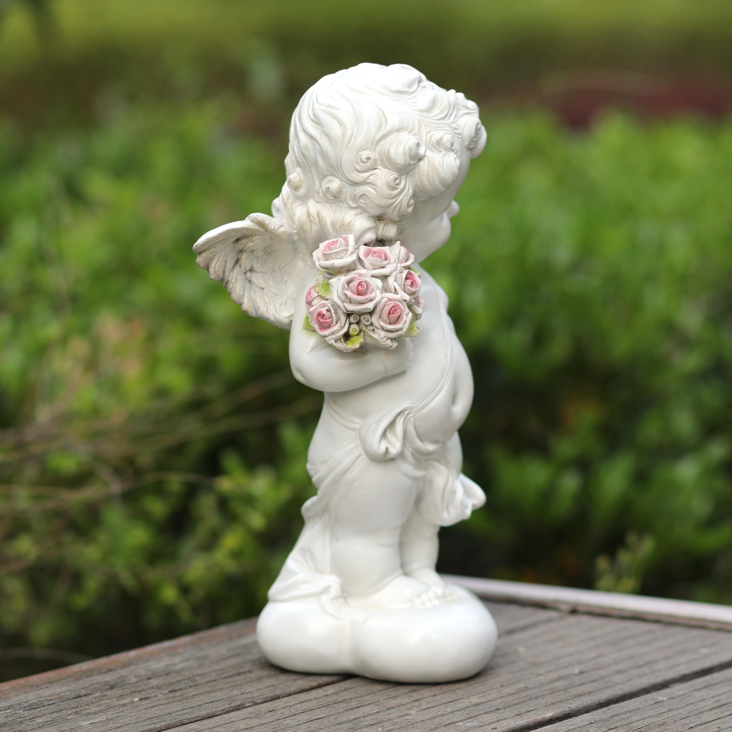 WSHMZYHOME statue placed in garden setting offering outdoor ambiance