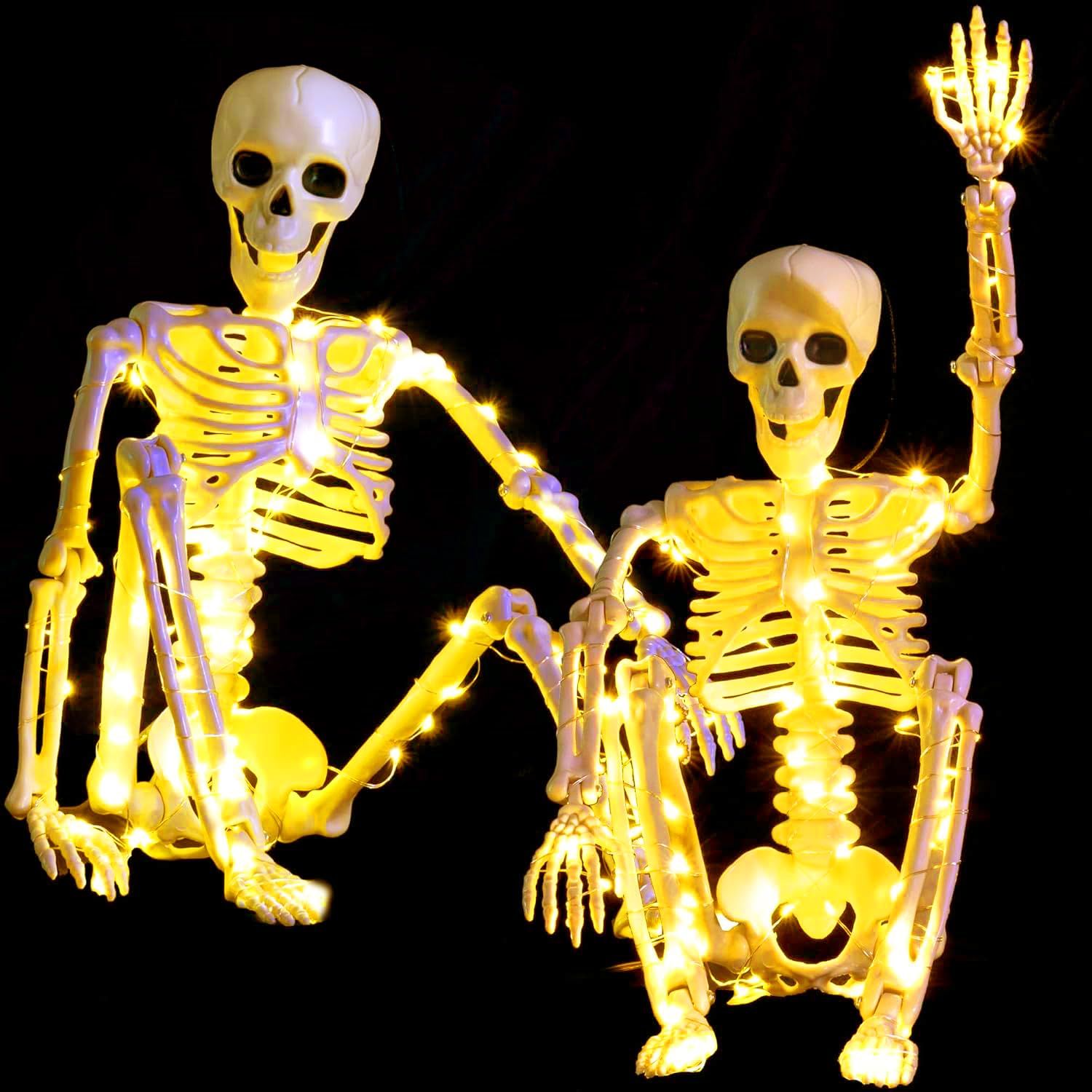 wymulot front-facing two-pack skeletons on table, adds instant Halloween atmosphere