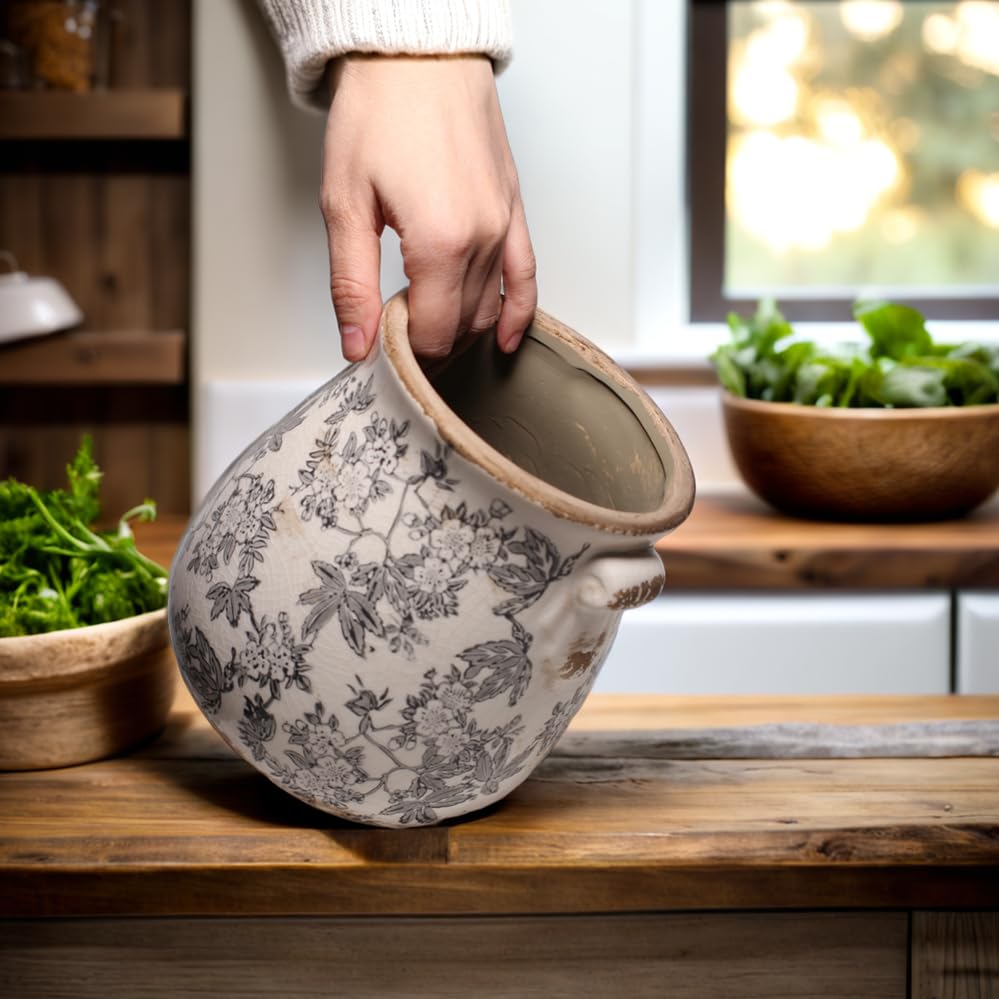 Xiaan Jiaju holding kitchen herbs on counter for convenient cooking access
