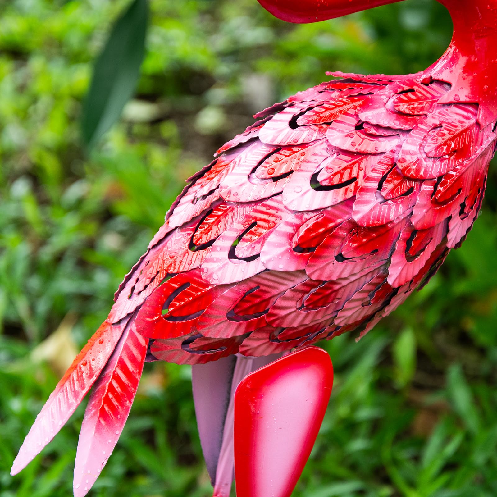 XONOR flamingos placed in garden patio scene adding vibrant curb appeal