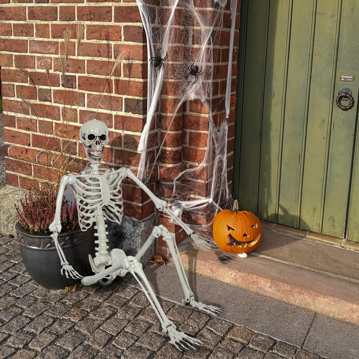 XONOR skeleton in Halloween yard scene creating dramatic seasonal impact