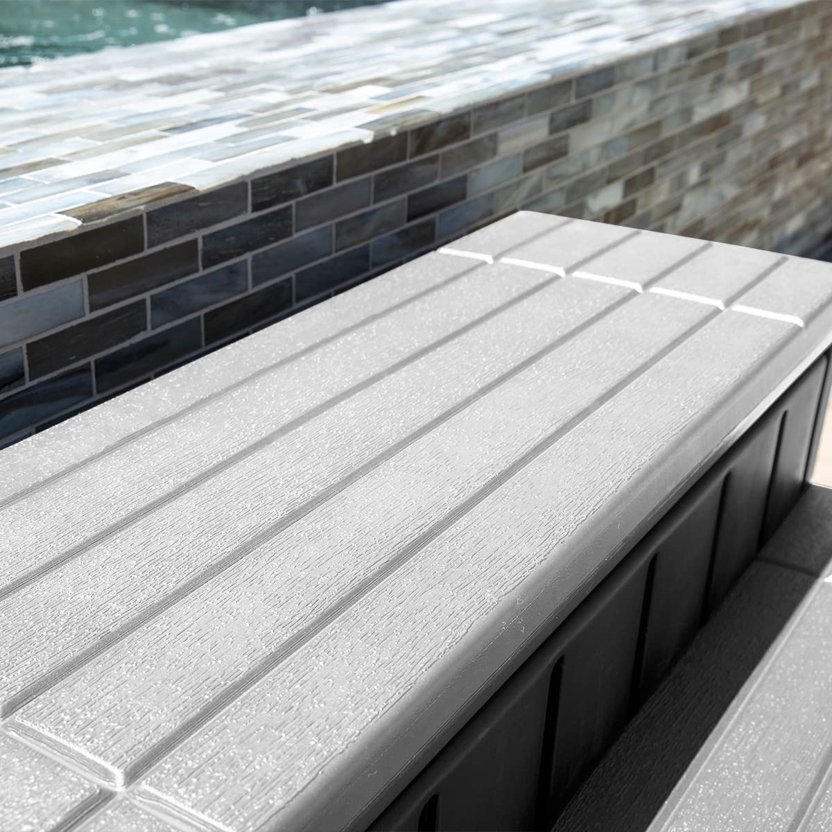 XtremepowerUS step placed by hot tub on patio enhancing tidy storage
