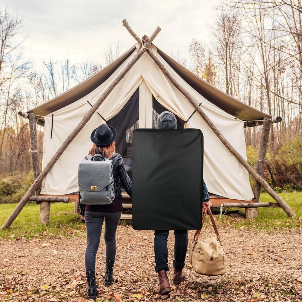 Xxerciz bag being carried at campsite demonstrating travel convenience
